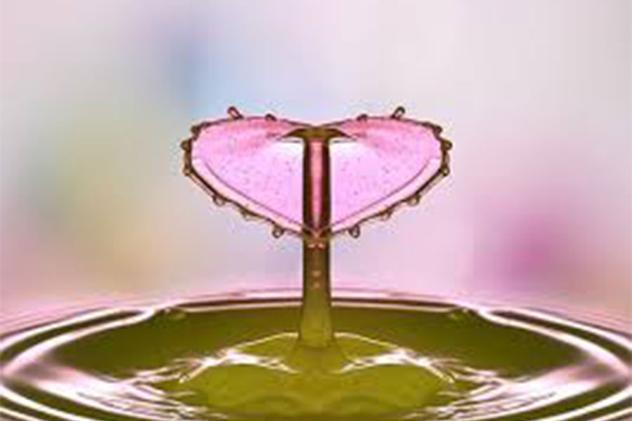 Pink heart shaped water droplet